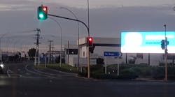 FIG. 1. In Hamilton, New Zealand, a digital billboard located close to an intersection with display colors similar to traffic signals could interfere with drivers’ attention and reaction time.