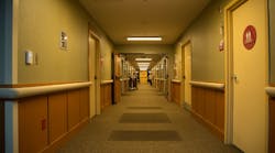 The Pacific Northwest National Laboratory (PNNL) has shared results of senior care-center study in which tunable solid-state lighting (SSL) was utilized in control and intervention scenarios. In this photo, nighttime corridor lighting was set at 2700K and dimmed to 20% output to gather data on its effect on residents’ sleeping and activity patterns. (Photo credit: Image courtesy of the Pacific Northwest National Laboratory/US Department of Energy Solid-State Lighting Program.)