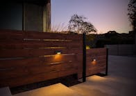 The SF Surface-Mounted Wall Light Simplifies Hardscape Installations - Surface-mounted, low-profile design for simplicity and modern elegance.